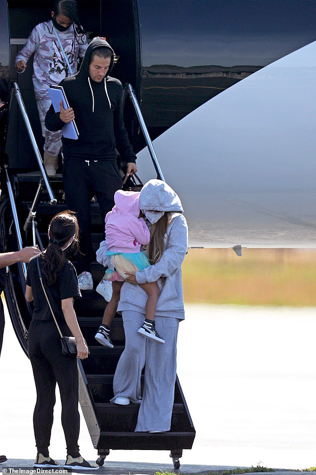 Beyonce and Jay-Z pictured for the first time since lockdown as they exit their private jet with Blue Ivy and their twins for a getaway in the Hamptons