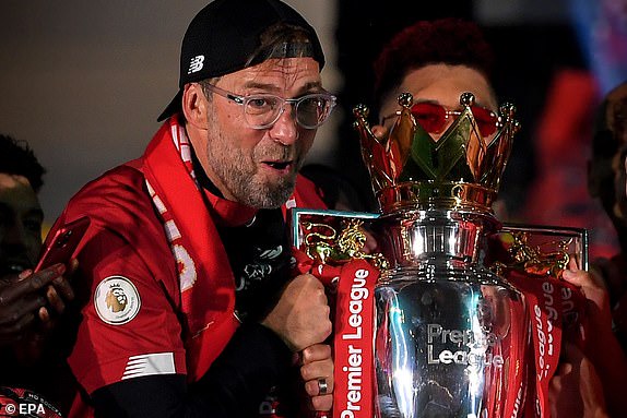 Liverpool lifts Premier League trophy after thrashing Chelsea 5 - 3 at Anfield (Photos)