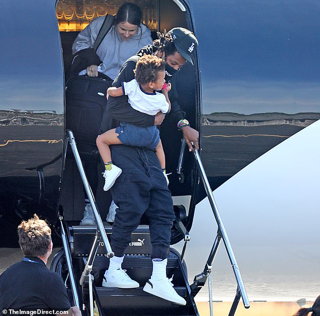 Beyonce and Jay-Z pictured for the first time since lockdown as they exit their private jet with Blue Ivy and their twins for a getaway in the Hamptons