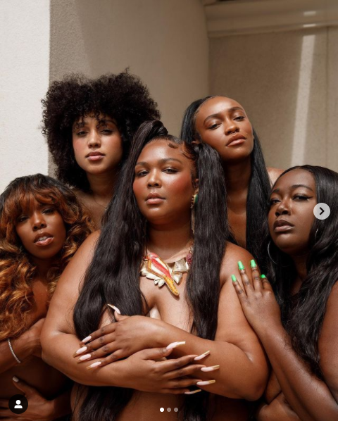 Lizzo poses completely nude with her besties in new photos