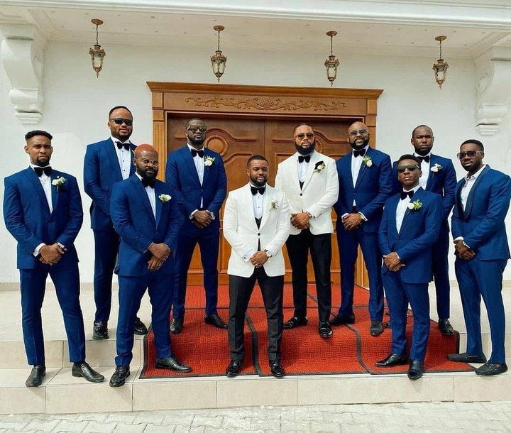 Uchembas men in blue suit