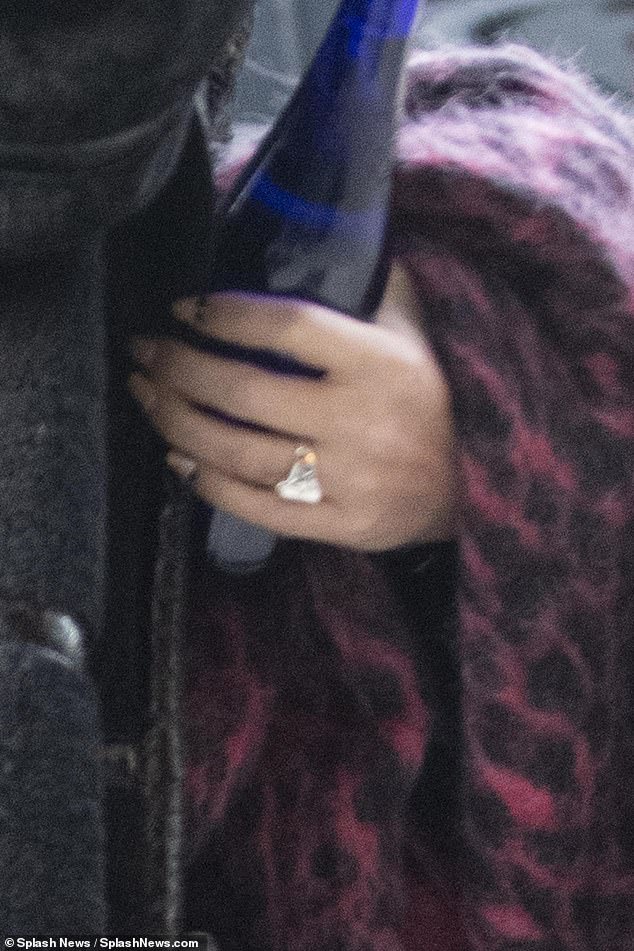  Megan Fox and Machine Gun Kelly spark engagement rumors after she?s spotted wearing band on wedding ring finger (Photos)