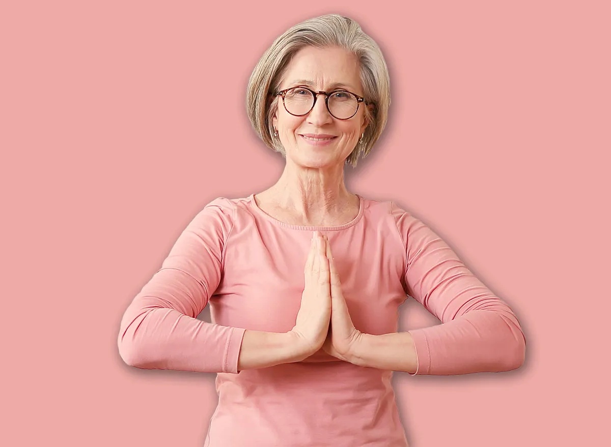 Senior mature woman make yoga pilates fitness and promotes wellness and happiness.
