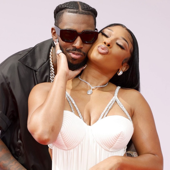 Megan Thee Stallion and her boyfriend Pardi Fontaine get cozy while on