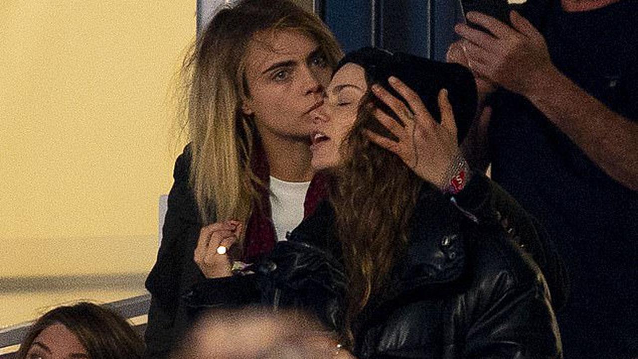 Someone Like You! Smitten Cara Delevingne shares a passionate kiss with new girlfriend Minke as they watch Adele perform at star-studded BST Hyde park show