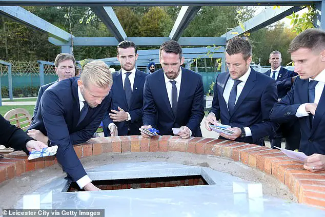 Kasper Schmeichel, Christian Fuchs and Vardy all place tributes in the well of the garden