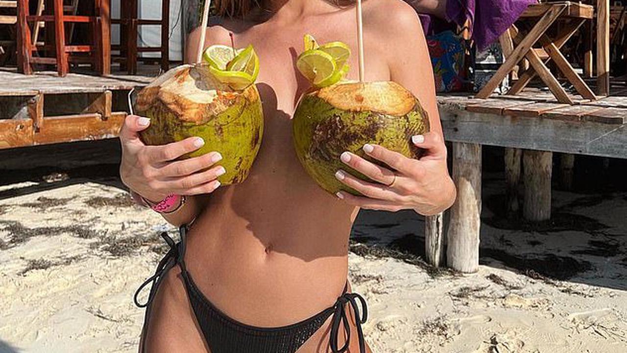 What a lovely pair of coconuts! Love Island's Georgia Steel protects her modesty as she goes topless during sunshine break in Mexico