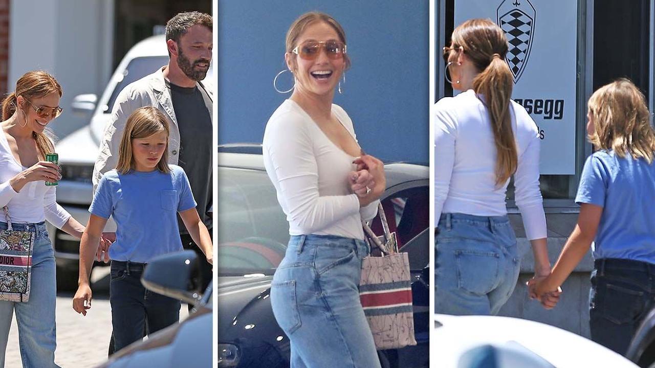 Jennifer Lopez sweetly holds Ben Affleck's son's hand as they shop for cars after accident