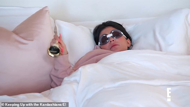 Help! Kris scurries off to fetch the drink, but she's barely left the room when the bell rings