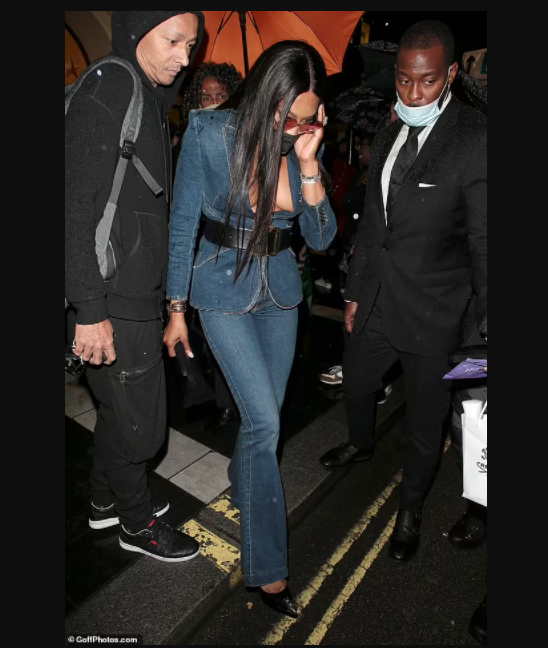 Braless Naomi Campbell, 51, suffers a nip slip in plunging denim co-ord at  Bob Marley