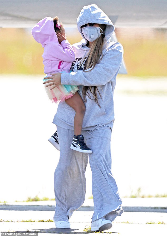 Beyonce and Jay-Z pictured for the first time since lockdown as they exit their private jet with Blue Ivy and their twins for a getaway in the Hamptons