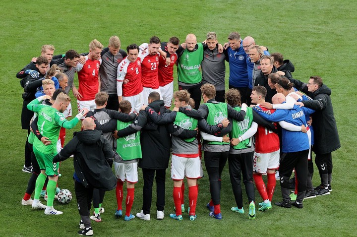 Eriksen's teammates formed a circle around him as paramedics administered CPR