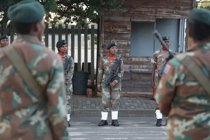 SA National Defence Force members wait for President Cyril Ramaphosa at Doornkop army base in Soweto to give them words of encouragement ahead of the national lockdown.