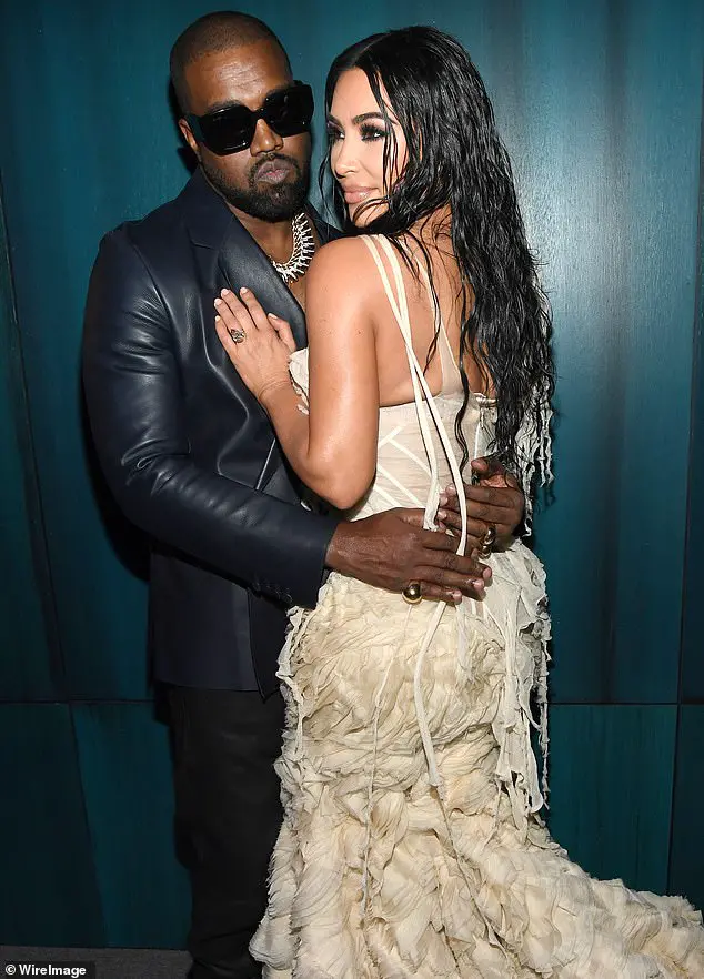 Chicken for all! Kanye West has teamed up with Chick-Fil-A to provide 300,000 meals to vulnerable people during the coronavirus pandemic; seen with Kim Kardashian in February