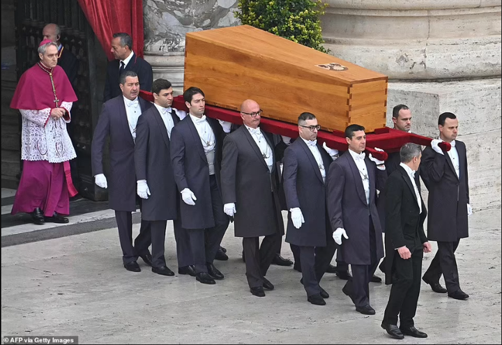 Pope Francis presides as Pope Benedict XVI is laid to rest (photos)