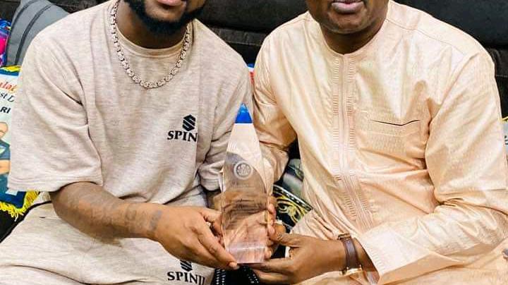 with-a-super-star-musician-see-lovely-photos-of-davido-in-abba-kyaris-office-yesterday