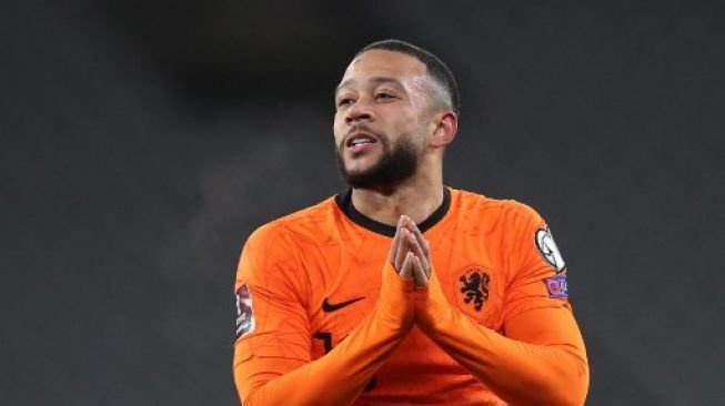 Striker Belanda Memphis Depay saat tampil di Kualifikasi Piala Dunia 2022 zona Eropa. 