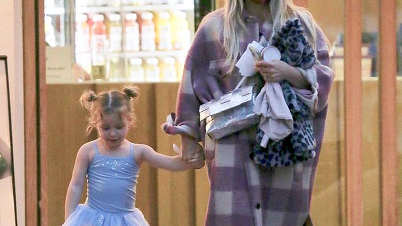 Hilary Duff wraps up in trendy plaid trench coat as she spends the day with her three-year-old daughter Banks