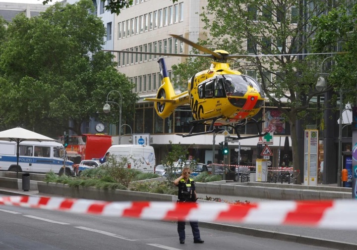 At least one person dead and 10 injured as car ploughs into crowd ...