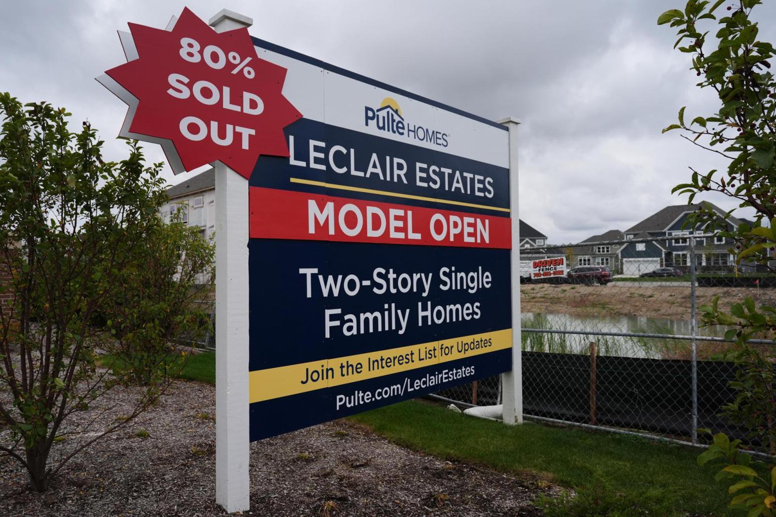 A sign stands in front of a new home construction site in Deerfield, Ill., Wednesday, Oct. 14, 2026. (AP Photo/Nam Y. Huh)
