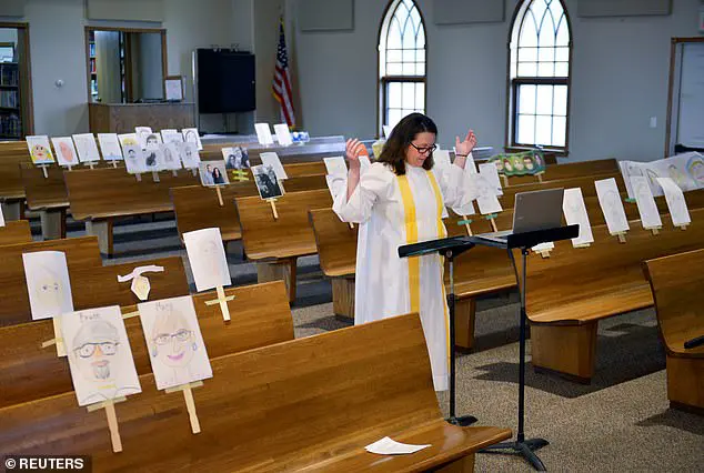 Pastor Emily Nesdahl leads a virtual Sunday service online broadcast due to the coronavirus disease (COVID-19) restrictions at Peace Lutheran church, featuring drawings of  parishioners taped to the pews, in Burlington, North Dakota, U.S. April 26, 2020. Picture taken April 26, 2020. REUTERS/Dan Koeck