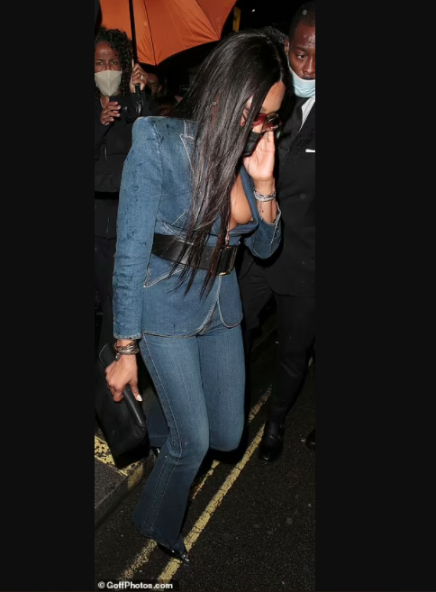 Braless Naomi Campbell, 51, suffers a nip slip in plunging denim co-ord at  Bob Marley