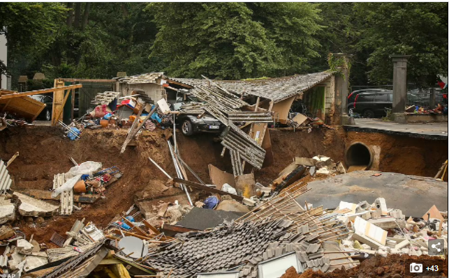 Scores dead and hundreds still missing in Germany landslide  (photos)