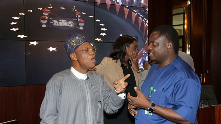 Minister of Information and Culture, Alhaji Lai Mohammed (Left), and spokesman to the President, Mr. Femi Adesina (Right)