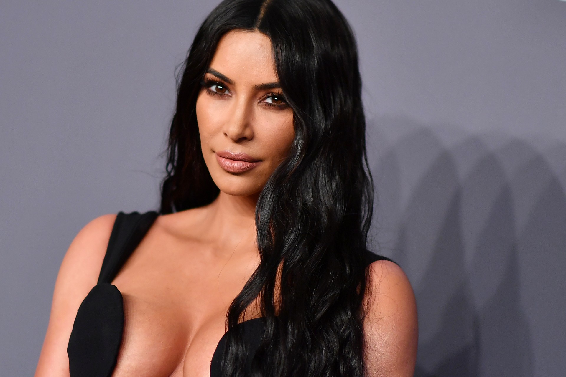 Kim Kardashian Wore Sheer Opera Gloves with a Tiny Bikini for Her Sports Illustrated Swimsuit