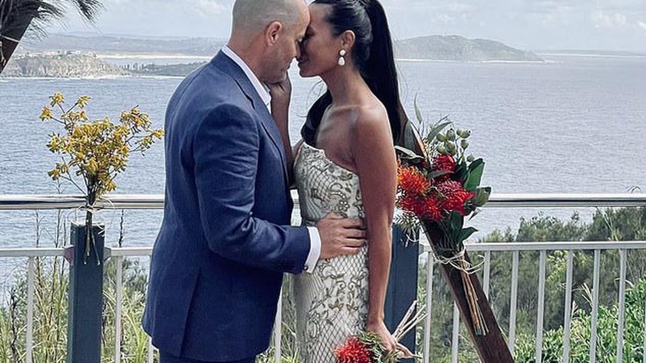 Comedian and radio host Adam Spencer marries his glamorous girlfriend Leah in a lavish ceremony by the ocean: 'Now for eternity together'
