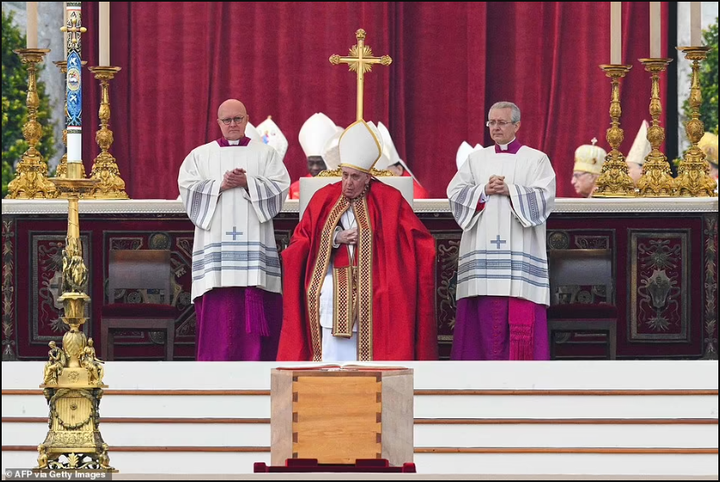 Pope Francis presides as Pope Benedict XVI is laid to rest (photos)