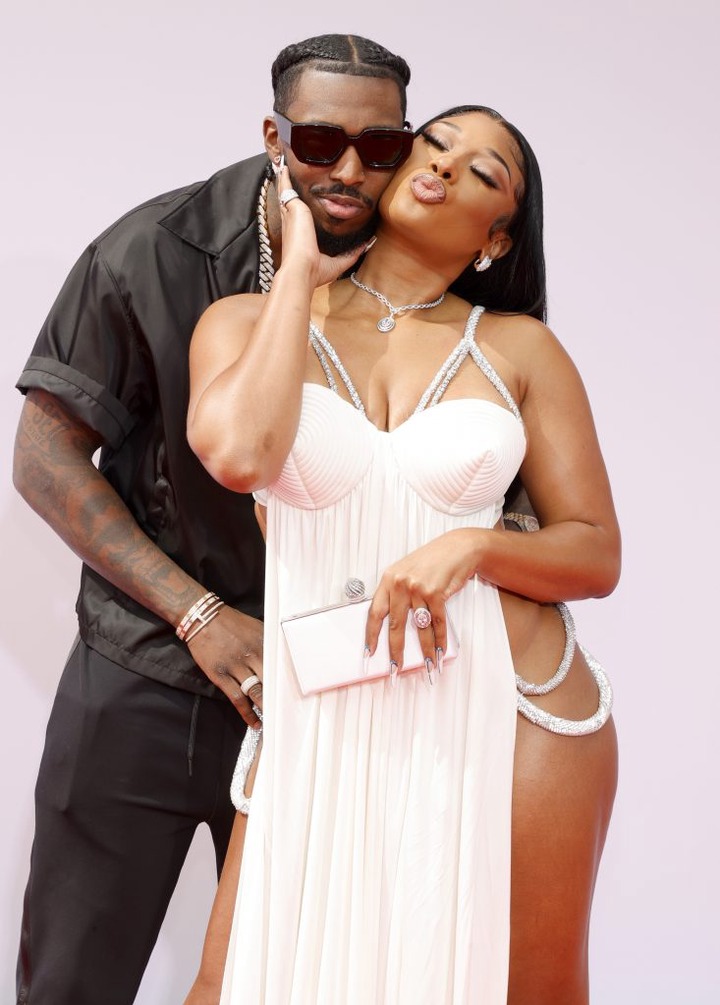 Megan Thee Stallion and her boyfriend Pardi Fontaine pack on the PDA at