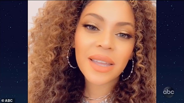 Hold tight: 'Please hold onto your families tight. Please be safe, don't give up hope. We're gonna get through this, I promise. God bless you,' Beyonce said after the song before she blew a kiss to the camera.