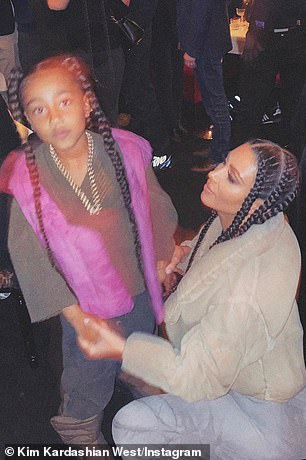 Long hair, don't care! Kim and little North both were both wearing matching plaited ponytail extensions braided by hair artist Chris Appleton