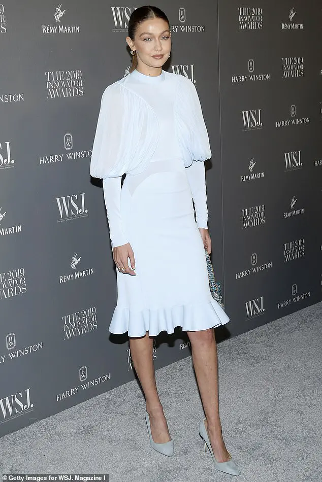 Powder blue: She hit the red carpet at the Museum of Modern Art in a slim long-sleeve powder blue dress