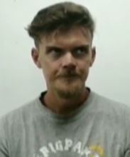  Luke Denman looks to his left when asked about who planned the raid - answering Donald Trump