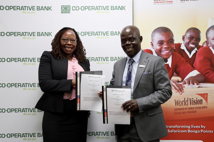 May be an image of 4 people, dais and text that says "O-OPERATIVE BANK We are you อ CO-OPERATIVE BANK BANK We Weareyou you ANGAZA FUND KENYA MAA O-OPERATIVE BANK We Weareyou you -OPERATIVE BAN reyou Weareyou you 대뚜함맛 CO-OPERATIVEE E We areyou ERATIVE BANK Weareyou you CO-OPERATIVE We are re you สูวอนล Prtmenttram rolir MEDOSEukvam wkvam Acoлиbl 4oHecTTeHeHeR CO-OPERATIVED We you 88 Wea មេនត O-OPERATIVEBA BA We you World Vision SUPPORTED SUPPORTEDBYWORIDVISIONKENYA BY WORLD WORLDVISION VISION KENYA SALGAAAREAPROGRAME SAIGAA RATIVE B We are you transforming lives by Safaricom Bonga Points"