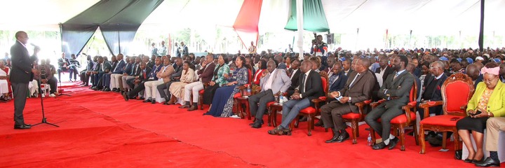 May be an image of 4 people, people standing and people sitting