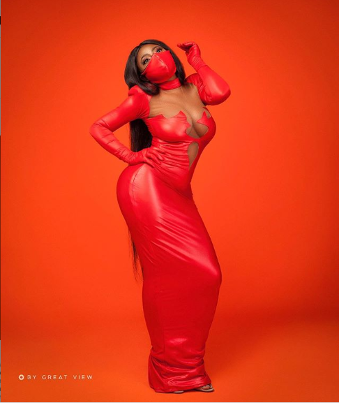 Actress, Yvonne Jegede stuns in cleavage-baring latex dress with matching nose masks (photos)