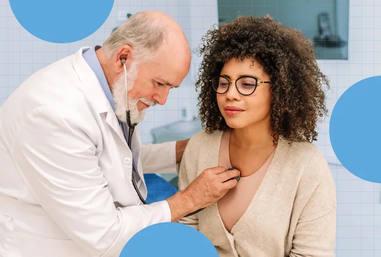 A doctor listens to a patients chest with a stethoscope during a medical checkup