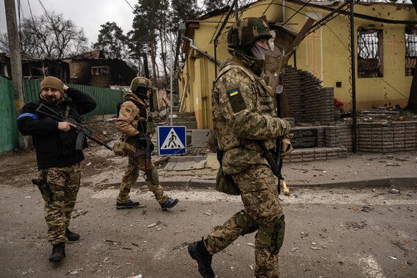 Ukrainian military patrolling Kyiv on Wednesday.