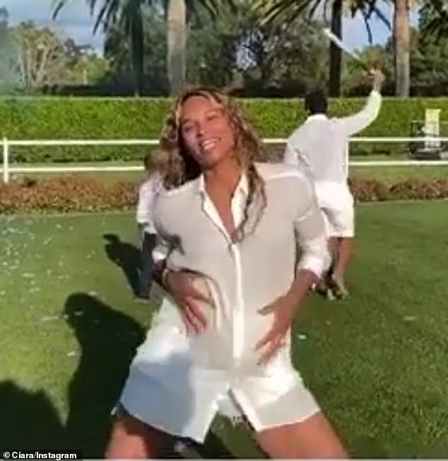 Feelin' it: Ciara hopped around and did the chicken dance as she clutched her baby bump upon revealing the gender