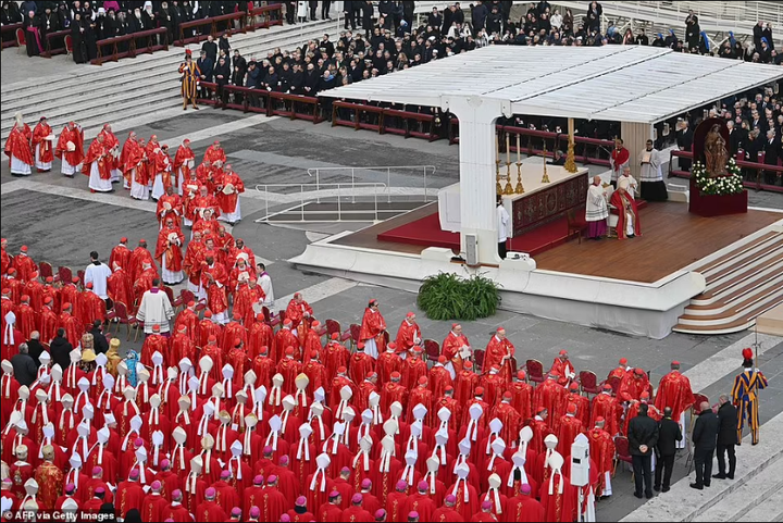 Pope Francis presides as Pope Benedict XVI is laid to rest (photos)