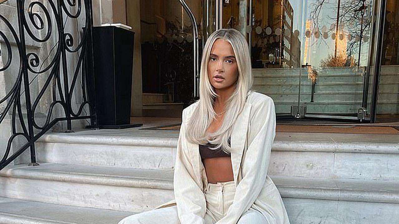 'I've been working on something HUGE!' Molly-Mae Hague flashes her abs in a chic cream suit as she teases London Fashion Week project with PLT