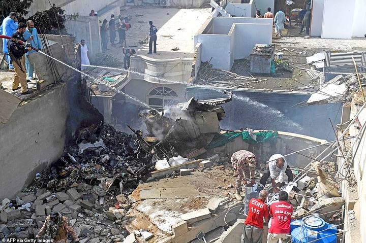 Pakistan plane crash: Two people pulled out alive from wreck of Airbus A320 that crashed in Karachi after