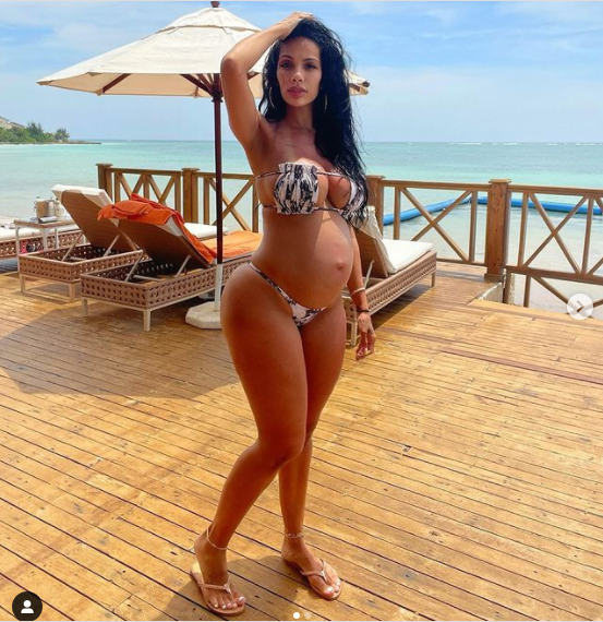 Pregnant Erica Mena flaunts her growing baby bump in new photos