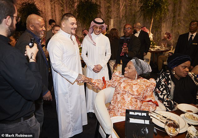 Andy Ruiz shakes Anthony Joshua's mother's hand at Thursday's gala dinner
