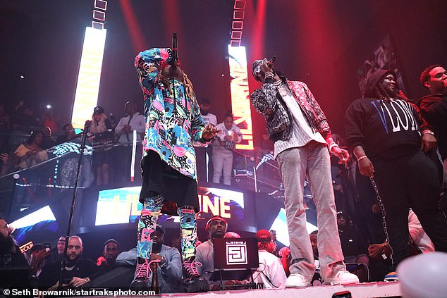 Sharing the spotlight: 2 Chainz, who headlined the nightclub the night before, made his way to the stage to perform alongside Lil Wayne for a crowd of adoring fans