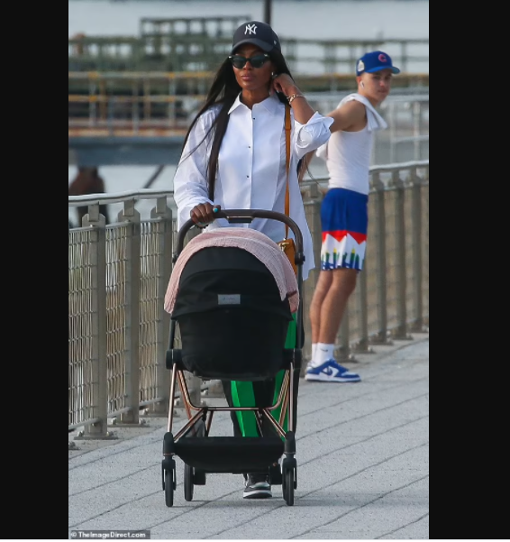 Supermodel Naomi Campbell, 50, is seen in public with her newborn daughter for first time (photos)