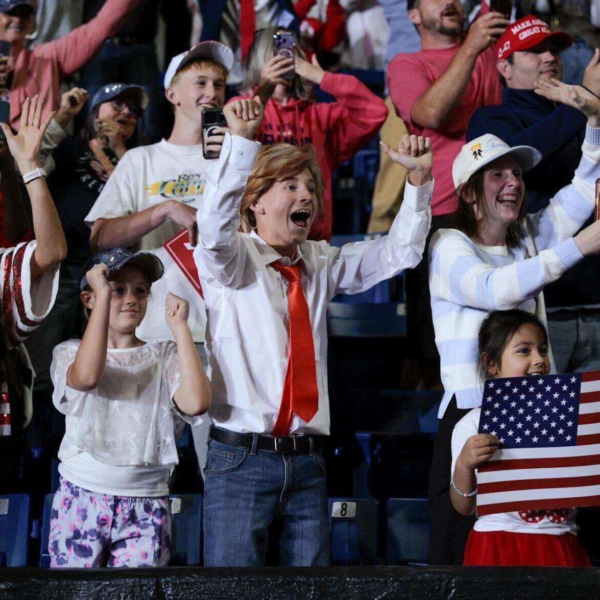 Audience members cheer as President Donald Trump delivers remarks during a campaign rally at Crossroads Arena on Oct. 26, 2026, in Corinth, Miss.